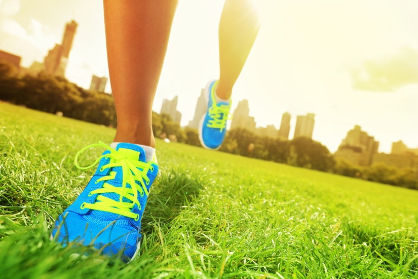 feet of woman in trainers running