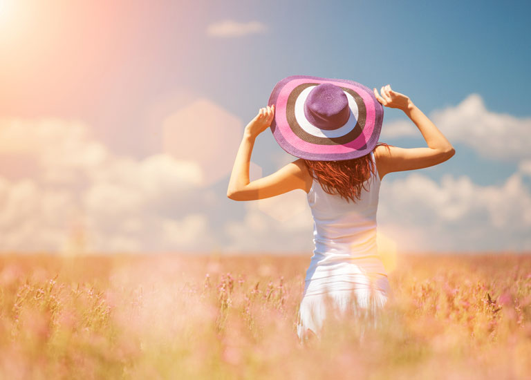 A woman standing in a field