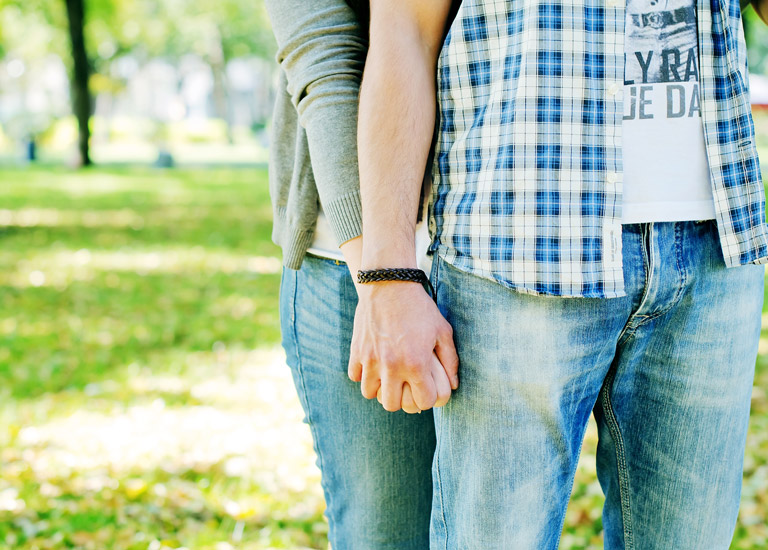 Couple holding hands