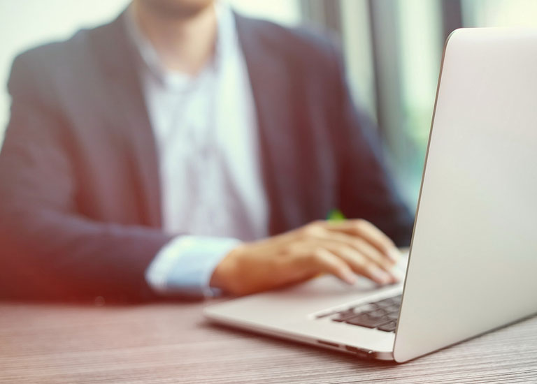 A man using a laptop