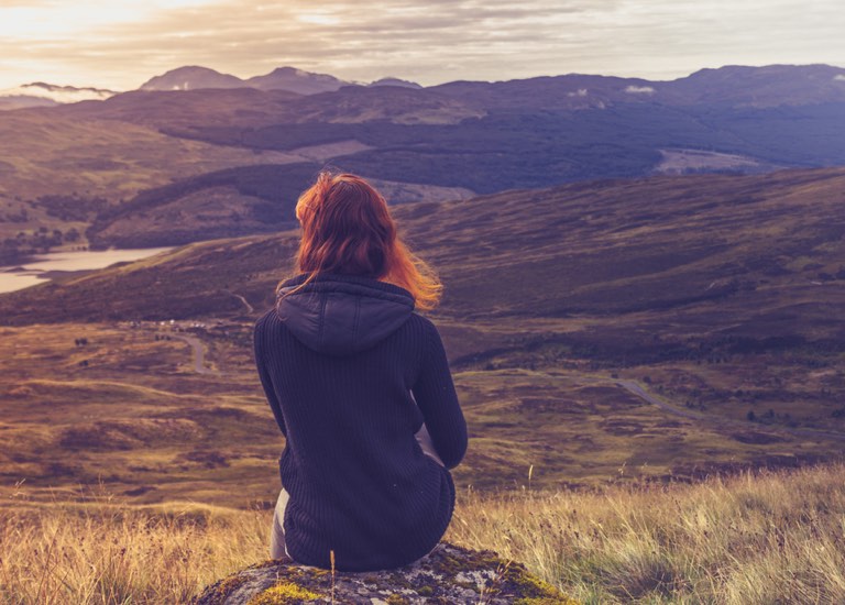 Sitting on a hillside looking at the view