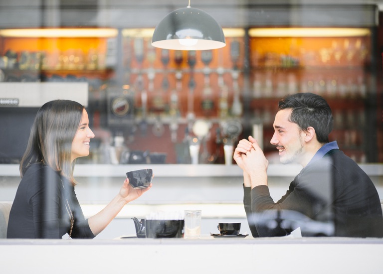 A couple meeting in a cafe