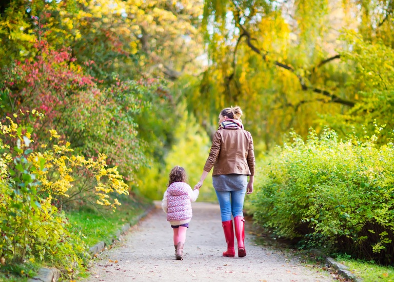 Mother walking with her child