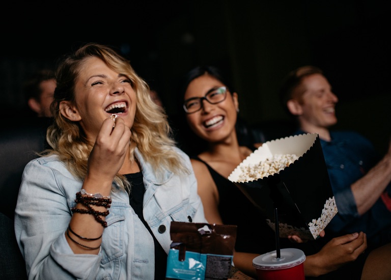 A group of young people enjoying the cinema