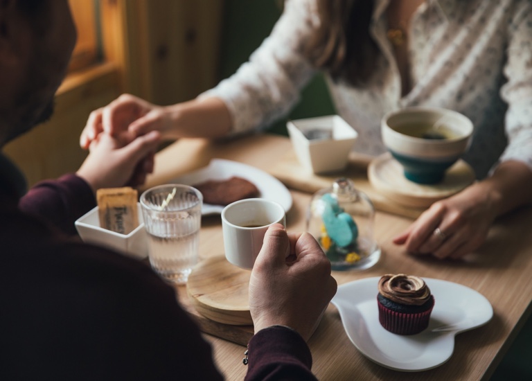 A couple sharing a meal together