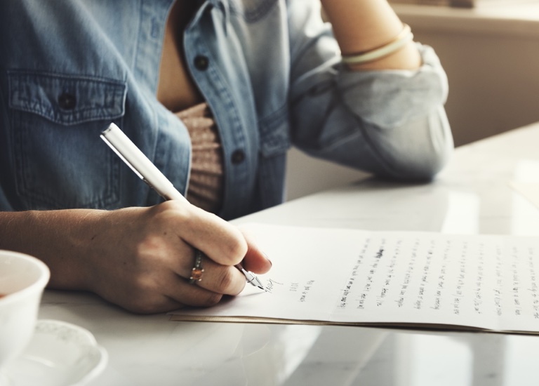 Woman writing a letter