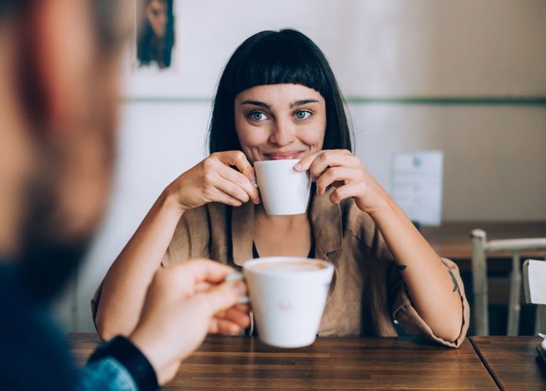 Coffee date, woman smiling