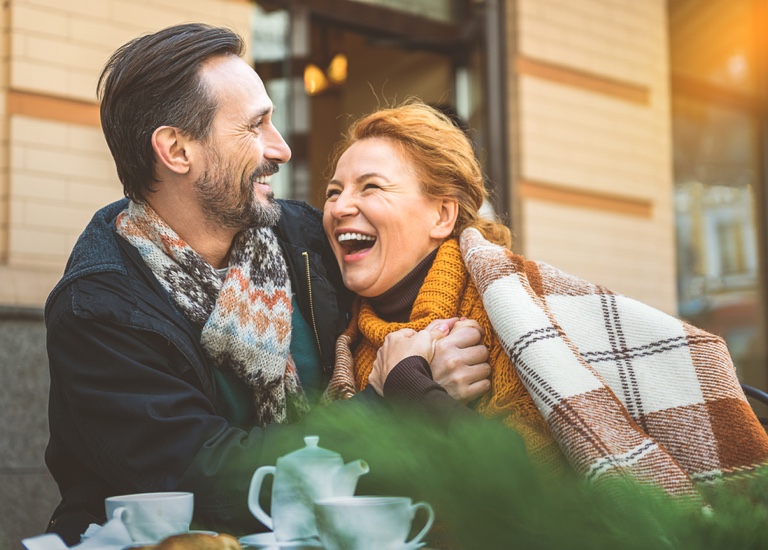 Older couple laughing together