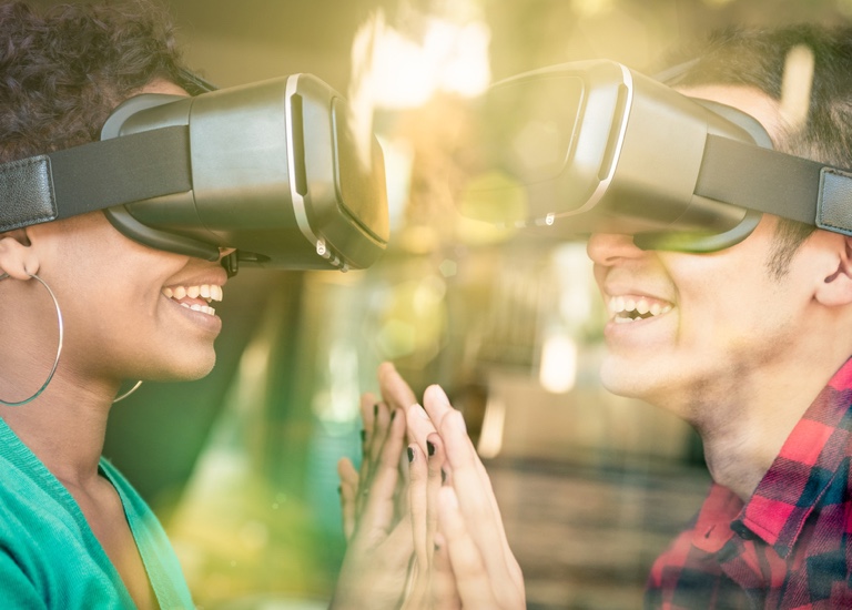 Two people on a date using virtual reality headsets