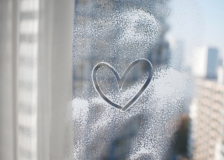 Heart shape drawn on a window