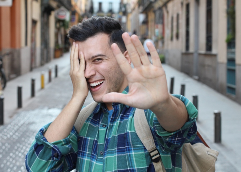 Man shying away from the camera