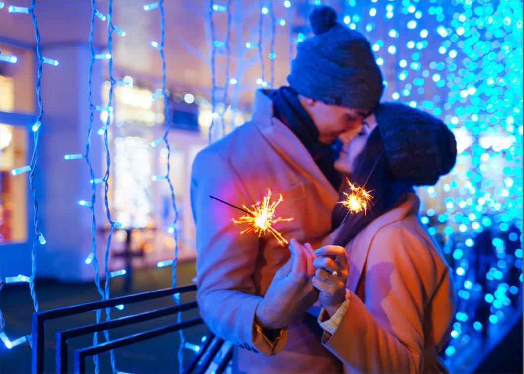 Couple at new year with sparklers