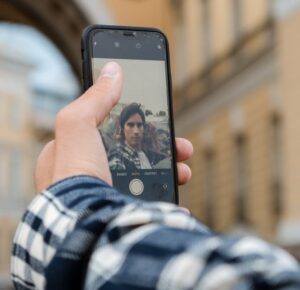 Man taking selfie - How to choose the best dating profile photos - Christian Connection blog