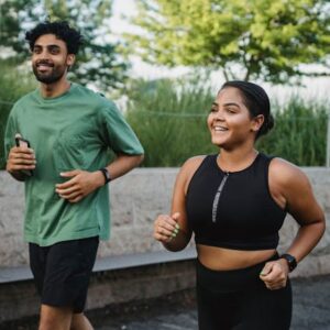Man and woman smiling as they run together - Why being authentic (and specific!) online leads to the best connections - Christian Connection blog