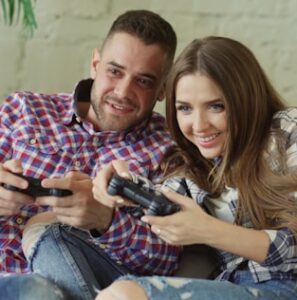 Man and woman playing video games together - Why being authentic (and specific!) online leads to the best connections - Christian Connection blog