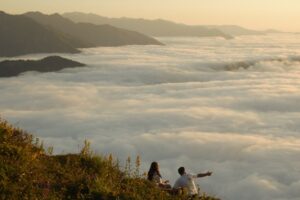 man and woman looking at cloud formation - date ideas in nature - Christian Connection blog
