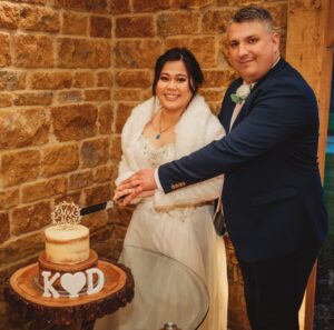 Daniel & Kath, who met on Christian Connection, cut their wedding cake