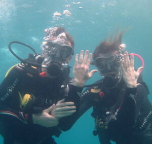 Elena and Josh who met on Christian Connection going scuba diving - 9 water date ideas to refresh your time together blog post
